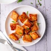Fried salmon nuggets in a plate.