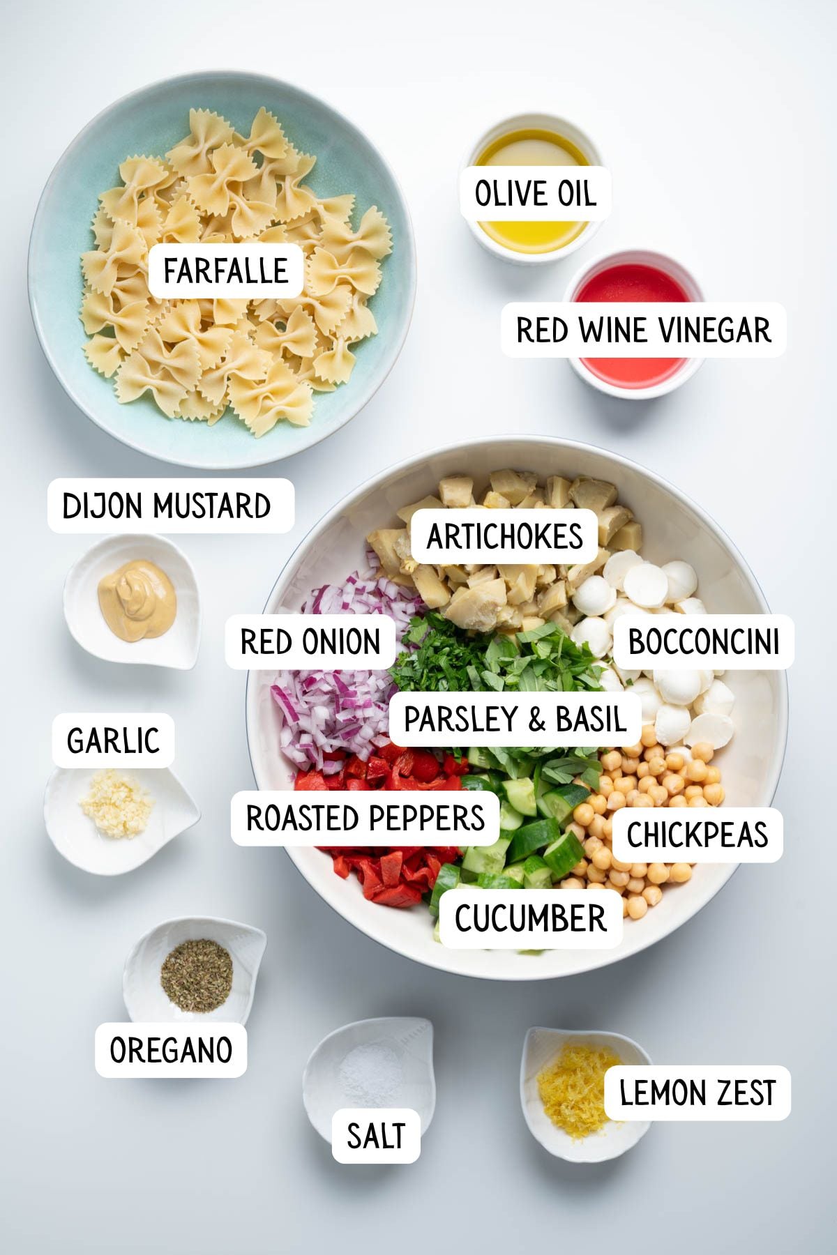 All the ingredients needed to made farfalle pasta salad.